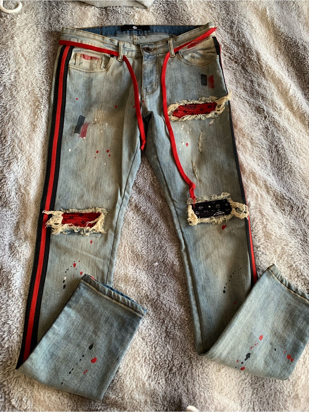 Men's Light Blue Skinny Jeans with Red Trim and Distressed Detail